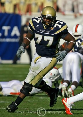 Georgia Tech OG Omoregie Uzzi gets out in front of a running play