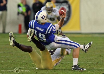 Georgia Tech DB Mario Edwards pulls down Duke QB Renfree as he throws the ball away to avoid the sack