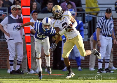 Georgia Tech CB Mario Butler intercepts a pass and returns it for a TD