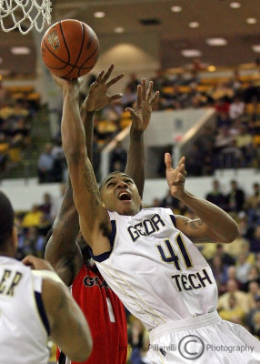 Georgia Tech G Rice gets off a shot after being fouled by Georgia G Leslie