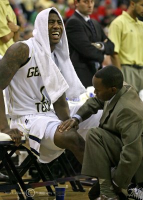 Jackets G Shumpert is in pain as he gets worked on by Athletic Trainer Richard Stewart