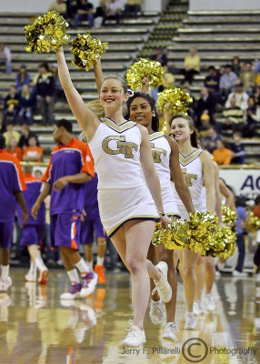Yellow Jackets Cheerleaders lead the team onto the floor to start the game