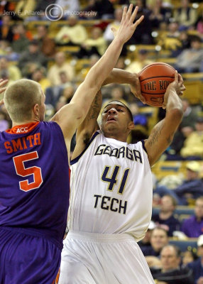 Georgia Tech G Rice looks to pass as he is pressured by Clemson G Tanner Smith