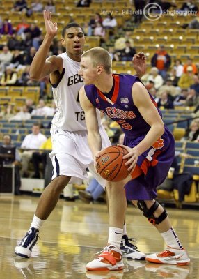 Yellow Jackets G Rice forces Tigers G Smith to look for an outlet pass
