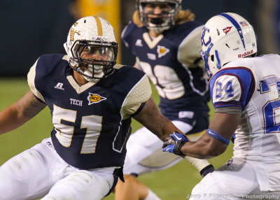 Georgia Tech LB Anthony Harrell attacks Presbyterian RB Lance Byrd