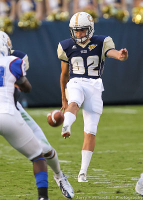 Georgia Tech P Sean Poole kicks on fourth down