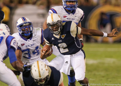 Yellow Jackets QB Lee breaks past the line of scrimmage