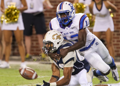 Georgia Tech WR Jeremy Moore attempts to make a catch with Presbyterian S Fred Marshall on his back