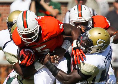 Georgia Tech LB Jeremiah Attaochu pulls down Miami RB Mike James