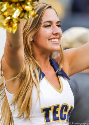Yellow Jackets Dance team member leads the crowd during the game