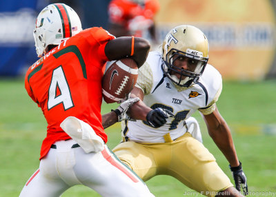 Jackets LB Joshua Rogers makes a play on Canes WR Phillip Dorsett