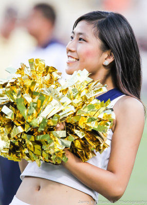 Tech Dance team member performs on the sidelines