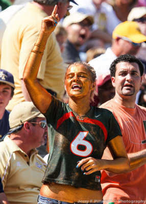 Hurricanes Glitter Girl cheers her team on from the stands