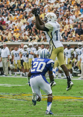 Georgia Tech A-back Smith goes up to catch a pass over Middle Tennessee State S Byard