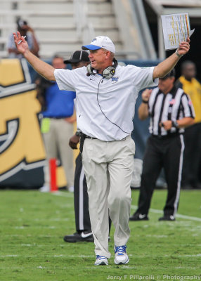 Middle Tennessee State Head Coach Rick Stockstill disagrees with a call by the referee