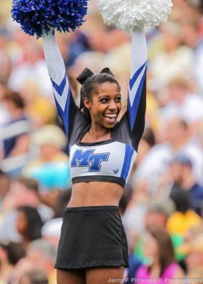 Blue Raiders Cheerleader performs for the Middle Tennessee State fans in the corner of the south end zone