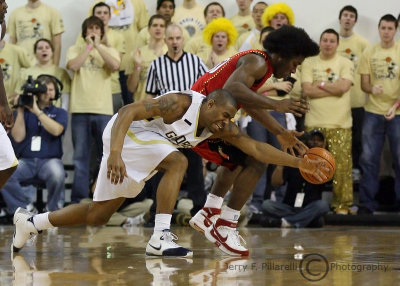 Georgia Tech F Smith attempts to steal the ball from Maryland F Osby
