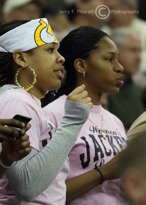 Tech womens basketball team members Iasia Hemingway and Alex Montgomery take in the action