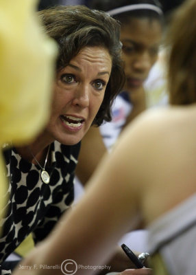 Yellow Jackets Head Coach MaChelle Joseph instructs her team during a timeout