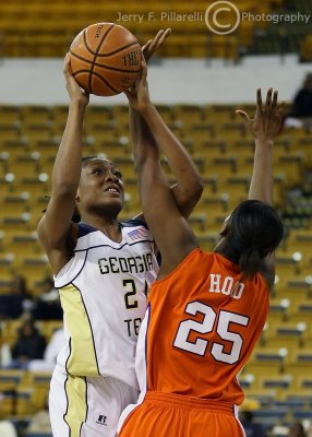Yellow Jackets F Mitchell tangles with Tigers F Whitney Hood