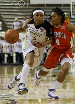 Tech G Jill Ingram attempts to get around Tigers G Brown