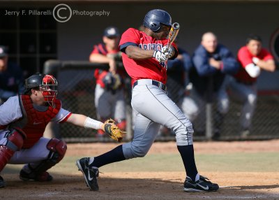 Wildcats LF Diallo Fon smashes a three run home run in the eighth to extend the Arizona lead