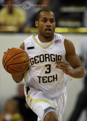 Georgia Tech G Maurice Miller brings the ball up court