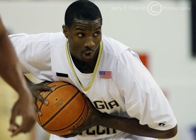 Jackets F Gani Lawal protects the ball