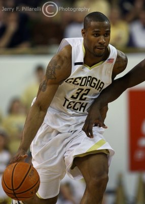 Yellow Jackets F Smith drives around a Clemson defender