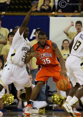 Georgia Tech F Lawal holds his ground against Tigers C Booker