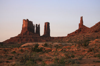 Stagecoach, Bear and Rabbit, Castle Butte and The King on his Throne turn red as the sun rises