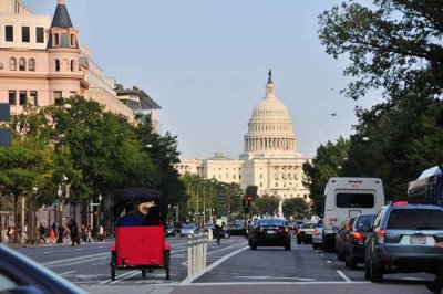 The Capitol amidst traffic