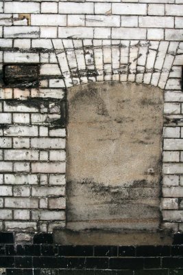 Weathered Brick Patched Window Arch174.jpg