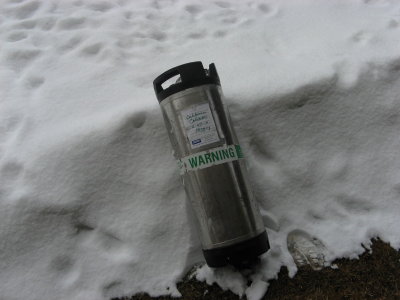 Cooling Emiko's beer keg in the snow    032710_0053.JPG