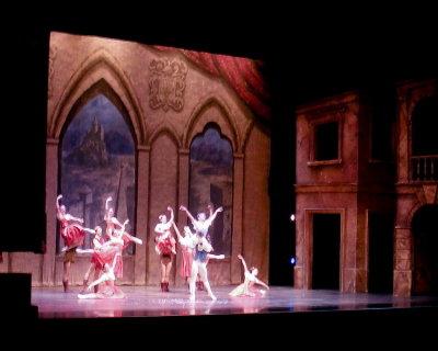 Daniel is lifting his partner in the middle (back) of the group, in Snow White.