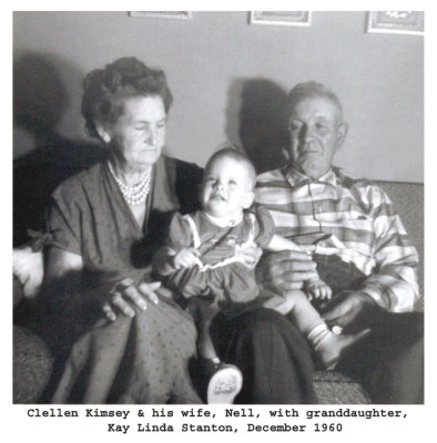 The Kimsey's with their granddaughter, Kay Linda Stanton. The original copy of this photograph is owned by their granddaughters, Kay Linda [STANTON] Burnos, and Karen Sue [STANTON] Stadler. They've donated a copy for our use here.