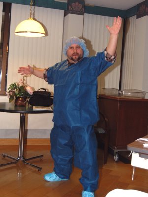 Vati gowns up for Isaac's coming out party. Oh man was I nervous. I HATE being in there. But, Mama likes me there, so I go, every time. I'll continue to go. Here I do my best to hide my fear. With each child I fear the loss of my wife, my friend, my partner and confidant. I never tell her these fears, but they're there nonetheless. I don't think I could bear it without that wonderful woman.
