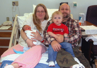 Our first family shot with Ike, taken when he was just a day old. Shown above are: Isaac David William Daniel, Salena Marie [ROBINSON], Hazelmarie Alena Rosina, and, Richard Merrill Coatney Portschy, MANN.