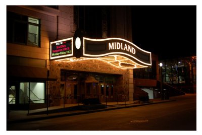 The same theatre at night. 