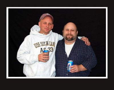 This is a shot we've been taking for twenty years now. The truth is, I don't even drink anymore. I haven't for years, but for some reason I still find this pose funny. Maybe it's because it makes our mother so bloody angry. David Jonathan, and his elder brother, Richard.