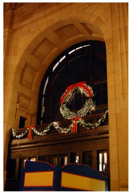 This is a poor shot of the holiday wreath hanging above the east archway.