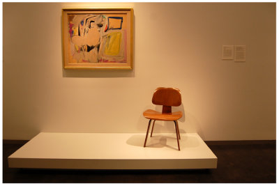 Okay, somebody please explain this one to me. How is this art? A guy sticks a chair under a painting and that's the exhibit?