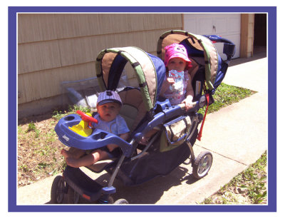 The Children. Getting the brood ready for a stroll around the neighborhood.