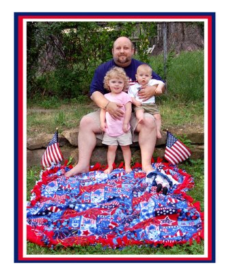 Daddy with his two little angels.