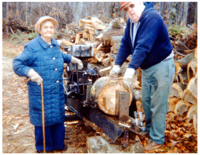 As he was referred by my wife. Above we see, George Raymond Uncle Ray, Mattson, cutting wood with his mother inlaw, Othilla Tillie [HAHN] Robinson, Elsner