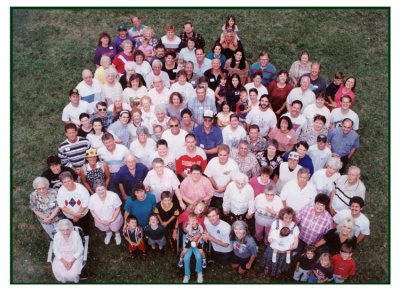 Too many folks in this shot for me to name. My mother, her mother, my aunts and uncles. I'm the dude with the NRA hat on, standing, squinting almost top left.
