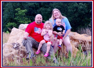 Wearing our best Patriotic shirtwear, the Mann Clan pose for their 2010 4th of July Family picture. Isaac was pretty uneasy about having his head shaved. So, Vati shaved his head too, in order to make him feel better. Thing is, Isaac's hair will grow back.  