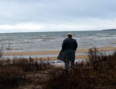 I love this shot. My wife took it of me looking out at Lake Michigan, from the coast line of the Upper Peninsula.