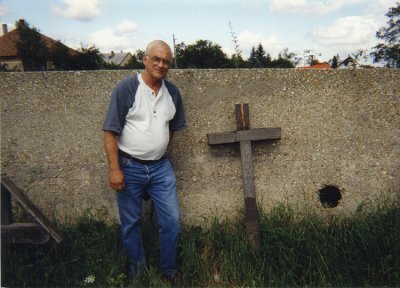 This shot was taken just inside the Hungarian border. The cross reads, Ruhe Deutsche Soldat. (Rest German Soldier)