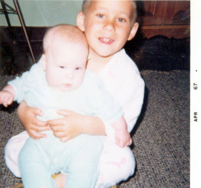 My infant brother David and I. Now, he's finishing up a twenty year career in the military & the father of two children of his own.